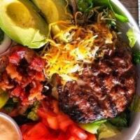 Burger Bowl · char-grilled burger patty, romaine, chopped tomato, pickle, red onion, shredded cheese with ...