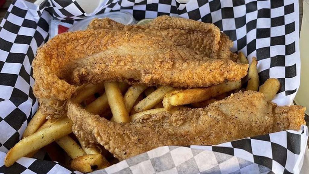 Fish & Chips · A crispy house breaded fish fillet with 2 sides of your choice, you can choose between our house seasoned fries, macaroni salad or coleslaw.
