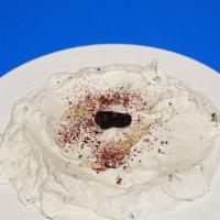 4. Thatziki · Labneh yogurt with, cucumber, dill & a hint of garlic.