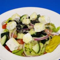 13. Greek Salad · Fresh lettuce, tomatoes, bell peppers, cucumbers, olives, topped with feta cheese & olive oi...