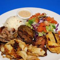 26. Grill Mix Plate · Comes with lamb beef & chicken gyro, beef & chicken shish & kofte. Comes with salad, rice, a...