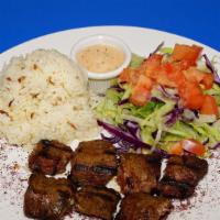 29. Beef Shish Kebab Plate · Char-grilled skewer of marinated beef chunks. Comes with salad, rice, and pita bread.