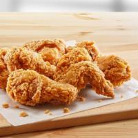 Buffalo Fried Chicken Wings · Golden-crispy fried chicken wings dipped in spicy buffalo sauce.