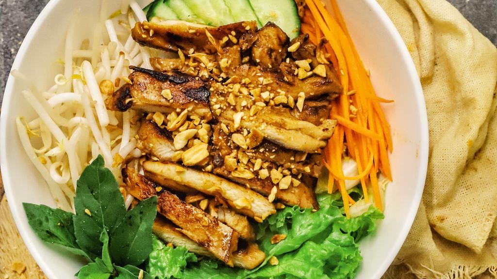 Tofu Vermicelli Bowl · Thin rice noodles served with grilled tofu, lettuce, cucumbers, carrots and fresh herbs. 
Garnished with fried shallots peanuts and house soy sauce.
