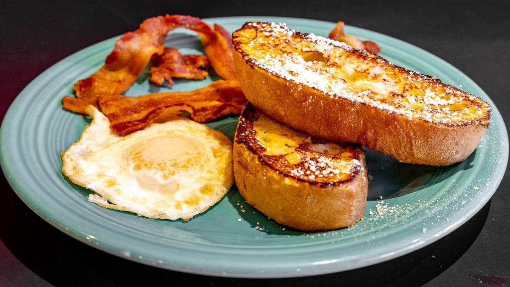 French Toast Special Breakfast · Two French toast pieces, two sausages and one egg.
