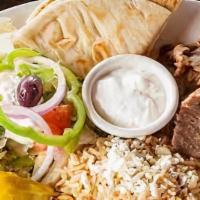 Kid's Gyro Beef Rice Plate · Includes rice 2 complimentary items and juice.