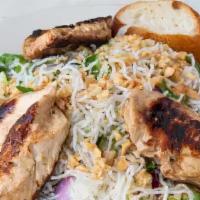 Asian Chicken Salad · Rice noodles, cabbage, romaine lettuce, carrots, cucumbers, red onions, cilantro and peanuts...