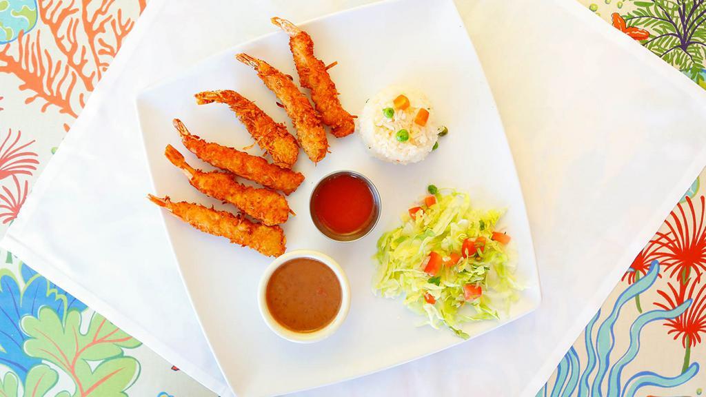 Camarones Empanizados · Breaded shrimp.