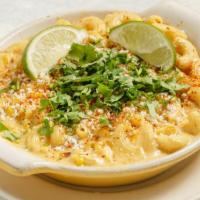 Elote Mac · You'll love it elote. 🌽 Roasted sweet corn, serrano peppers, cheddar and Monterey Jack. Top...