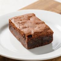 Gluten-Free Vegan Brownie · A gluten-free, vegan version of our fudgy brownie, by The Inspired Cookie Co.