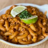 Mexican Vegan Mac · Our Vegan Mac with chipotle adobo, topped with cilantro and lime.