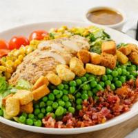 Homeroom Cobb Salad · Romaine, grilled chicken, bacon, cherry tomatoes, peas, feta, corn and croutons, with balsam...