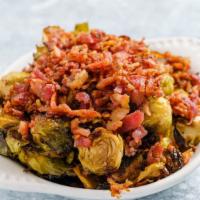 Bacon Brussels Sprouts · Slow roasted and tossed with bacon in a maple balsamic glaze.