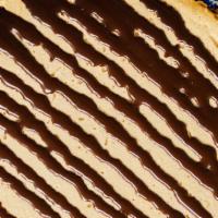 Whole Peanut Butter Pie · Creamy peanut butter filling inside a crunchy graham cracker crust and drizzled with homemad...