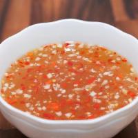 Sweeten Fish Sauce · Traditional Vietnamese fish sauce.  Watered down, sweetened up, hint of lime for freshness. ...