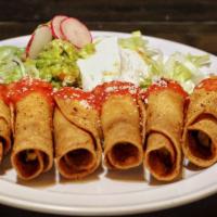Taquitos (6 pieces) · 3 ham and Cheese crispy tacos served with a side of sour cream, guacamole and sweet salsa.