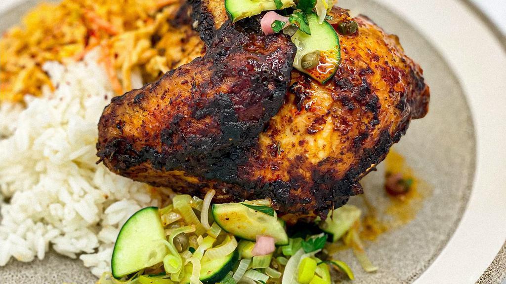 Breast Quarter Chicken · Our famous ancho-mustard rubbed 38 North chicken. Served with a crunchy salsa verde, adobo buttermilk slaw and jasmine rice. Substitute spring greens for rice at no charge. Gluten free.