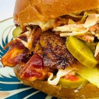 BBQ Chicken Sandwich · Pulled 38 North chicken breast in our house BBQ sauce. Served on a soft bun with adobo slaw ...