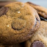 Brown Butter Chocolate Chip Cookie · Merchant Roots' original cookie masterpiece, made with cultured brown butter, muscovado suga...