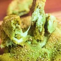 Green Tea Sesame Cookie · Sweet matcha cookie wrapped in toasted sesame seeds, with a hint of white chocolate and fleu...