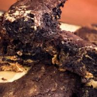 Dark Chocolate Peanut Butter Cookie · Gooey dark chocolate cookie with swirls of peanut butter, made with cultured brown butter.