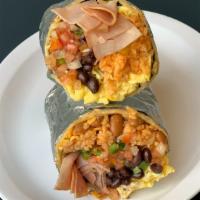 Scrambled Eggs with Ham, Home Fries, Black Beans, and Pico De Gallo Burrito · Sometimes the simplest things are the best.