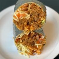 Pulled Pork Burrito with Fries, Pinto Beans, and Avocado Burrito · Who doesn't like carnitas?