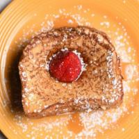 French Toast · 3 Texas Style breads dipped in our rich & creamy batter, grilled to golden brown. Dusted wit...