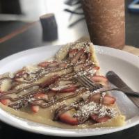 Nutella Crepe · Served with Bananas and Strawberries Drizzled with Nutella. Add more items at an upcharge.