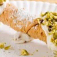 Cannoli · House-made Cannoli Shell, Chocolate Chip packed Sweet Ricotta Cream, topped with Pistachios ...