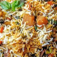 R3. Vegetable Dum Biryani · Garden vegetable cooked with selected spices with saffron flavored basmati rice.