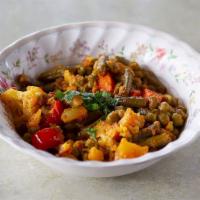 V3. Mixed Vegetables · Vegetables cooked with special spices.