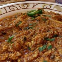 06. Brain Masala · Lamb brain cooked with onion, tomatoes and selected spices.