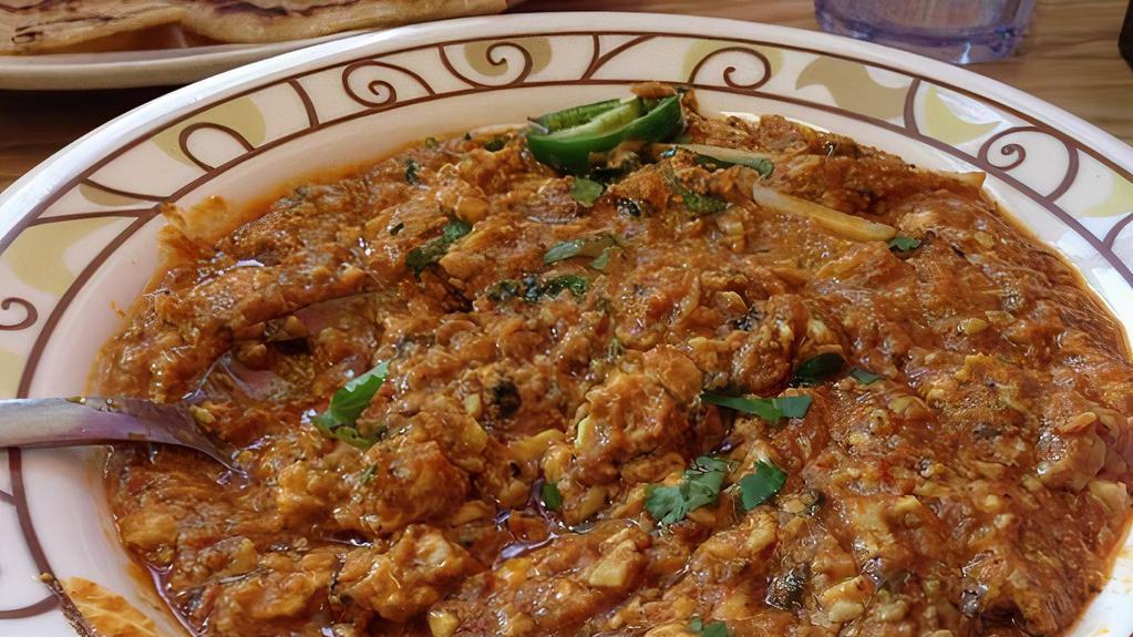 06. Brain Masala · Lamb brain cooked with onion, tomatoes and selected spices.