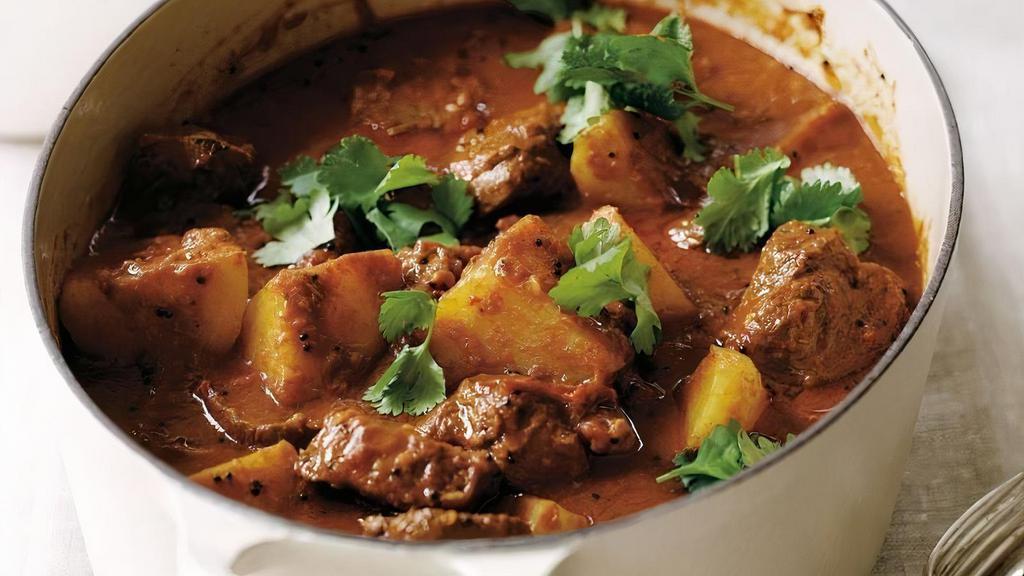 07. Lamb Vindaloo · Traditionally is a spicy hot dish made with lamb and potatoes, vinegar and lots of hot red chilli peppers.