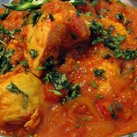 08. Chicken Vindaloo · Traditionally is a spicy hot dish made with chicken and potatoes, vinegar and lots of hot re...