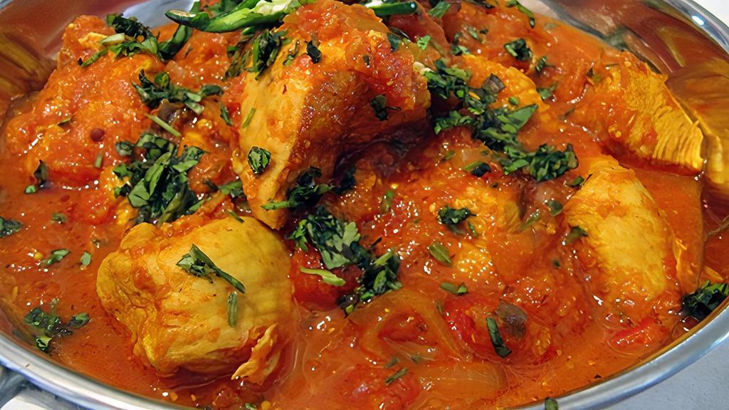 08. Chicken Vindaloo · Traditionally is a spicy hot dish made with chicken and potatoes, vinegar and lots of hot red chilli peppers.
