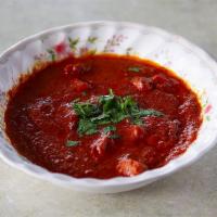 C5. Chicken Tikka Masala · Boneless chicken tandoori barbecued in a clay oven, then cooked in a very special curry sauc...