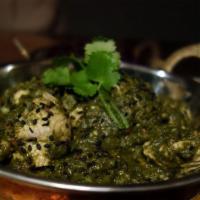 C4. Saag Chicken · A delectable combination of fresh spinach cooked in traditional, blend of chicken curry.