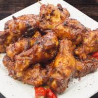Teriyaki Wings · Baked, all natural chicken tossed in sweet honey and pineapple teriyaki sauce. Served with a...