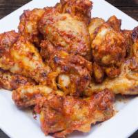 BBQ Chipotle Wings · Baked, all natural chicken tossed in bbq chipotle sauce. Served with a side of ranch dressing.
