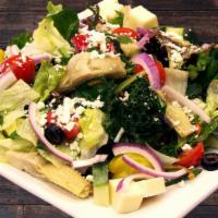 Greek Dinner Salad · Lettuce, tomatoes, onion, olives, cucumber, artichoke hearts, carrots, pepperoncini, and fet...