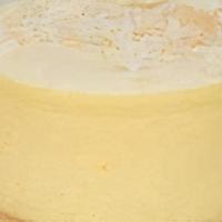 Coconut Cheesecake · Creamy cheesecake topped with coconut