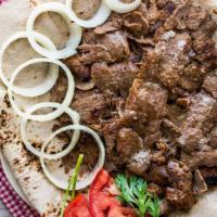 Lamb & Beef Gyro Plate · Tender lamb and beef gyros served with rice and salad.