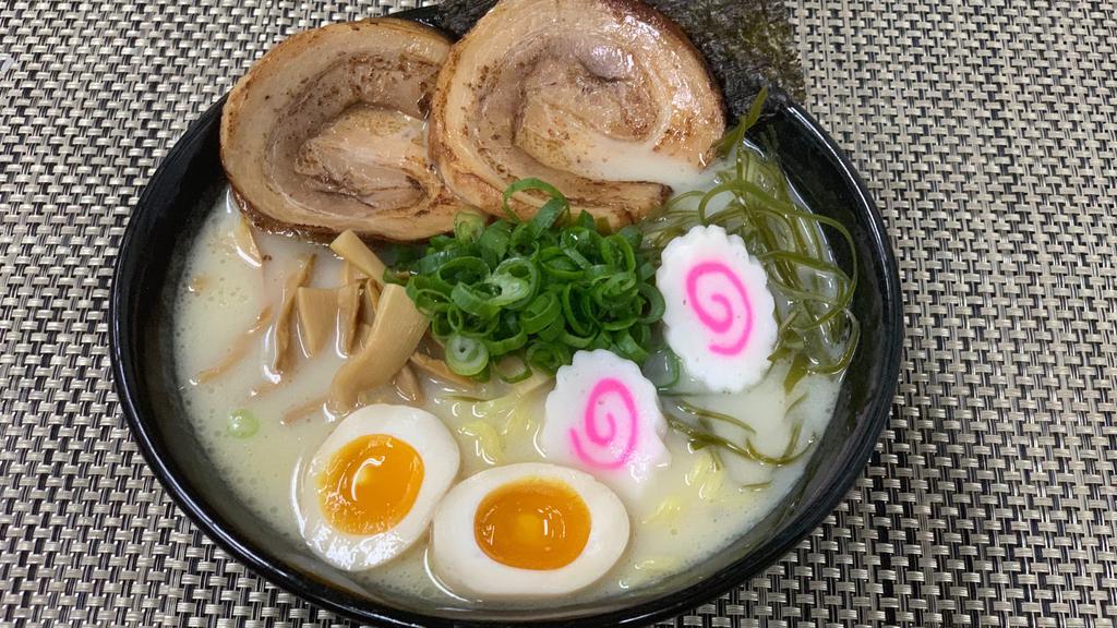 R1. Tonkotsu Ramen · Roasted pork, boiled egg, bamboo shoots, fish cake, green onion,  roasted seaweed and bean sprouts