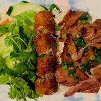 Grilled Pork & Egg Roll Over Rice · Com thit cha gio.