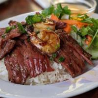 Grilled Beef & Shrimp Over Rice · Com bo tom nuong.
