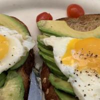 avocado toast · served on toasted whole wheat  with two  eggs cooked to order with sprinkling of salt and pe...
