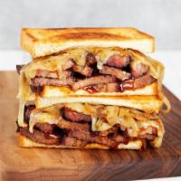 Brisket Melt · Griddled sandwich with brisket, melty pepperjack cheese, barbecue sauce, on your choice of b...