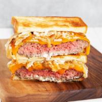 Patty Melt · Griddled sandwich with burger patty, melted yellow cheddar, mayonnaise, caramelized onions, ...